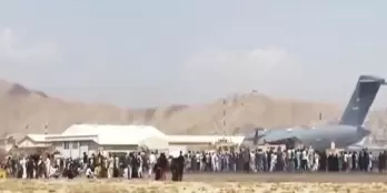 Tear gas fired to control crowds at Kabul airport